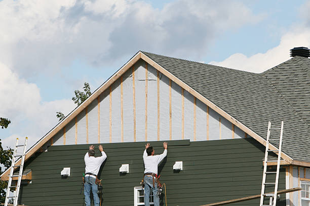 Professional Siding Installation technician working in Eaton, IN